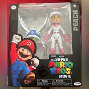 The Super Mario Bros. Movie Princess Peach w/ Shell Action Figure Toy Gift NWT